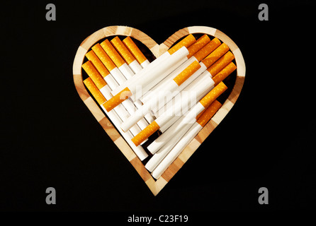Cigarette with the Heart Shape Stock Photo