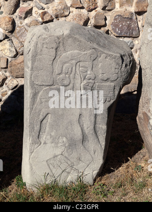 Bas-relief depicting the figure of a soldier sacrificed in the ancient Zapotec city of Monte Alban Stock Photo