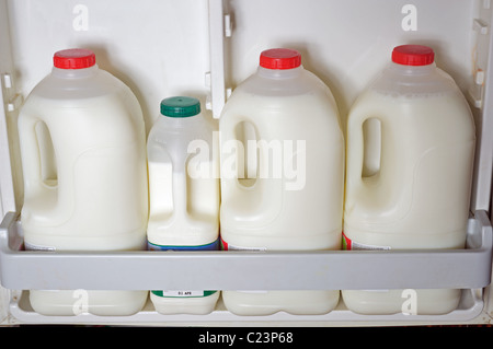 Milk in fridge, UK. Stock Photo