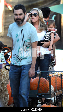 Busy Phillips and husband Marc Silverstein with their daughter Birdie Silverstein visit Mr. Bones Pumpkin Patch to select a Stock Photo