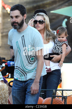 Busy Phillips and husband Marc Silverstein with their daughter Birdie Silverstein visit Mr. Bones Pumpkin Patch to select a Stock Photo