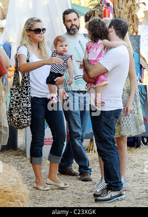 Busy Phillips and husband Marc Silverstein with their daughter Birdie Silverstein visit Mr. Bones Pumpkin Patch to select a Stock Photo