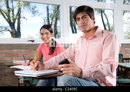 students, at, university, classroom, campus, looking, at, the, camera, working, studying, high-school, further-education. Stock Photo