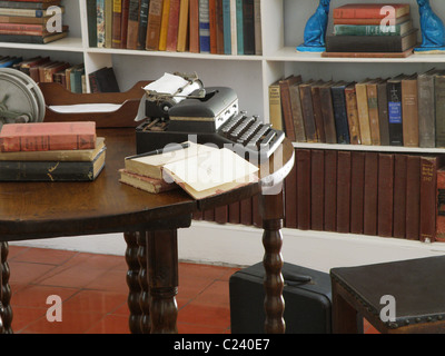 Ernest Hemingway's private den and writing room. His typewriter sits in this retreat at Hemingway house in Key West, Florida. Stock Photo