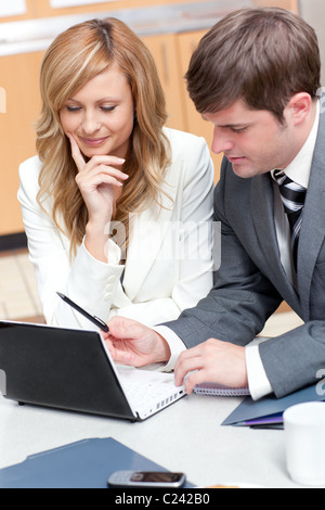 Two businesspeople working on a presentation Stock Photo