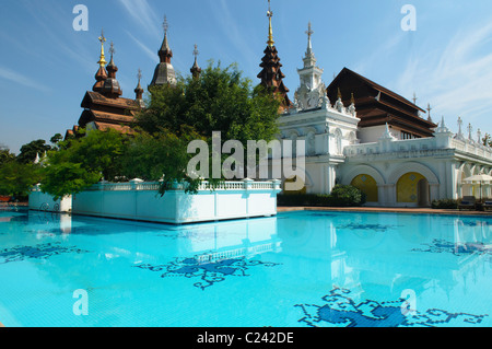 swimming pool at the luxurious Dhara Dhevi Resort in Chiang Mai, Thailand Stock Photo