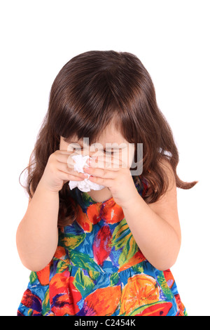 Little three year old girl having the sniffles or sneezing from being sick or allergies Stock Photo