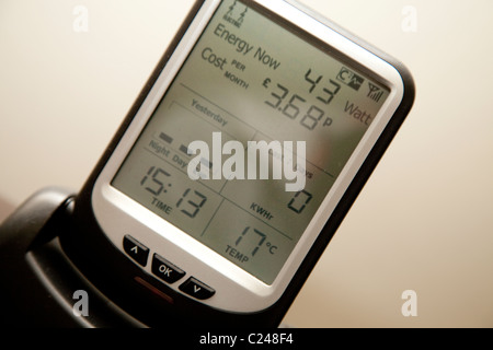 An EON electricity smart meter monitoring live consumption of electricity in a domestic property England UK Stock Photo