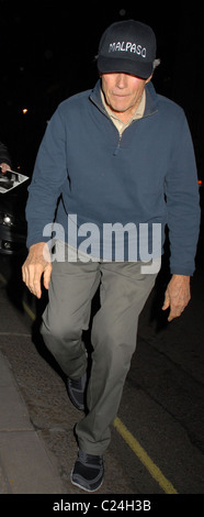 Clint Eastwood is spotted outside Claridge's hotel wearing a cap bearing the name of his production company, Malpaso London, Stock Photo