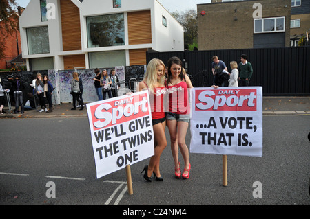 The Daily Sport girls declare their support for the twins John and Edward outside the 'X Factor' house London, England - Stock Photo