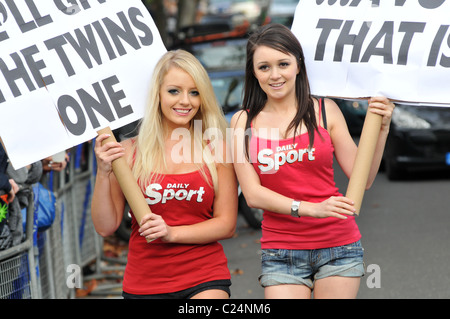 The Daily Sport girls declare their support for the twins John and Edward outside the 'X Factor' house London, England - Stock Photo