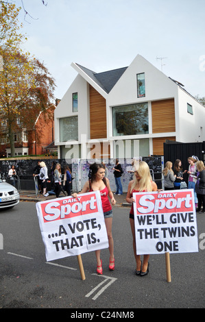 The Daily Sport girls declare their support for the twins John and Edward outside the 'X Factor' house London, England - Stock Photo