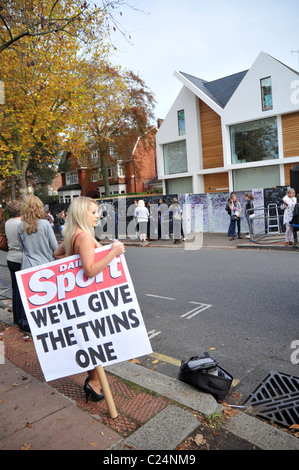 The Daily Sport girls declare their support for the twins John and Edward outside the 'X Factor' house London, England - Stock Photo