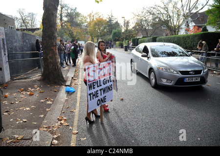 The Daily Sport girls declare their support for the twins John and Edward outside the 'X Factor' house London, England - Stock Photo