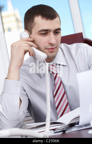 Portrait of a businessman talking on the phone Stock Photo