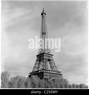 Paris, France,1950. The famous wrought-iron lattice tower, the Eiffel Tower in this historical picture by J Allan Cash. It opened in 1889. Stock Photo