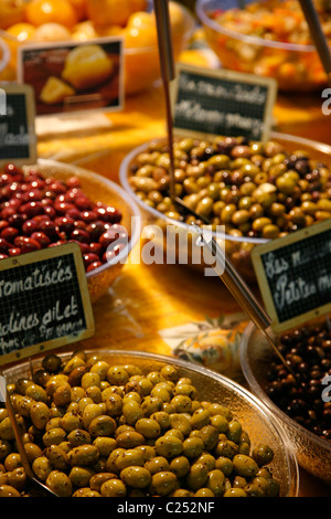 Stall selling olives at the Cours Massena market in the old town, Antibes, Alpes Maritimes, Provence, France. Stock Photo