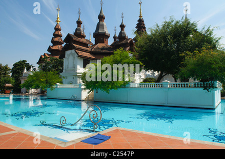 swimming pool at the luxurious Dhara Dhevi Resort in Chiang Mai, Thailand Stock Photo