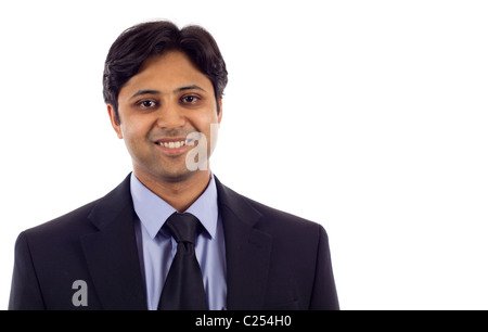 Successful smiling young Indian business man isolated over white background Stock Photo