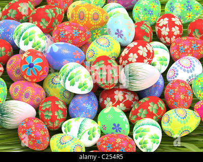 Many colorful Easter eggs on green grass Stock Photo