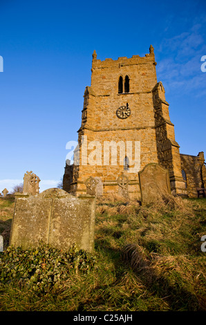 The restored exterior with its clock tower of All Saints Church on the Viking Way in Walesby Stock Photo