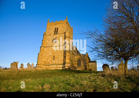 The restored exterior with its clock tower of All Saints Church on the Viking Way in Walesby Stock Photo