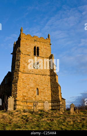 The restored exterior with its clock tower of All Saints Church on the Viking Way in Walesby Stock Photo