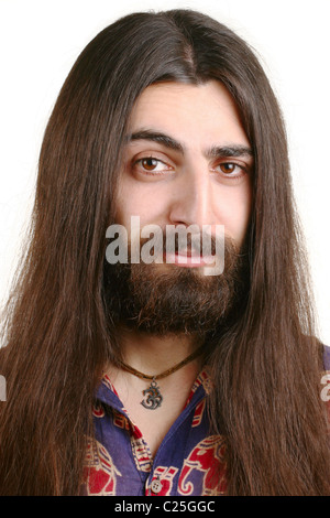 Long-haired smiling hippie man Stock Photo