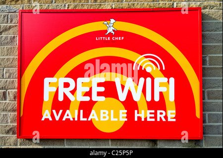 Free WiFi sign on the wall outside a Little Chef restaurant Stock Photo