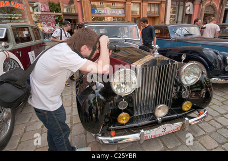 Taking pictures of The Spirit of Ecstasy mascot on 1948 Rolls-Royce Silver Wraith at R-R Club meeting, Świdnica, Silesia, Poland Stock Photo