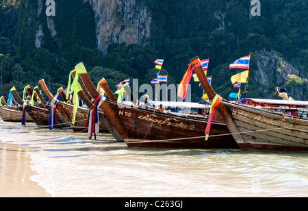 Thai longtail boats on Railay Beach in Krabi, Southern Thailand Stock Photo