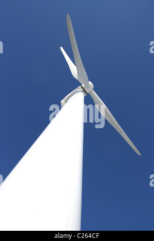 View of single windmill generating electricity against blue sky Stock ...