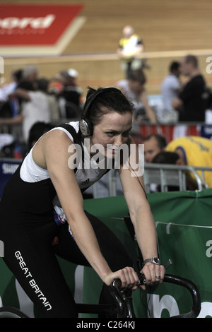Victoria Pendleton racing cyclist warming up on turbo trainer 25/3/11 Apeldoorn Velodrome UCI Track Cycling World Championships Stock Photo