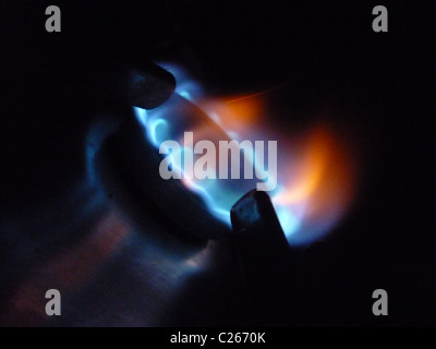 Gas stove burning in the dark Stock Photo