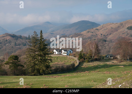 Looking over the cottage at Low Park,  Skelwith Bridge in the Lake District towards the mountains of Heron Pike and Great Rigg