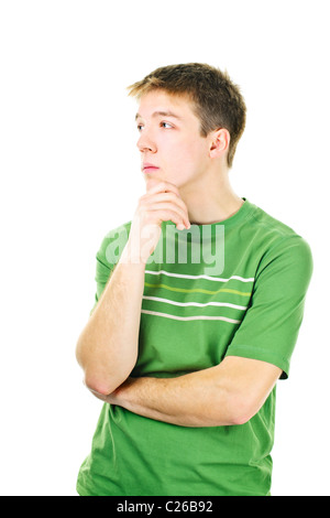 Thoughtful young man standing isolated on white background Stock Photo