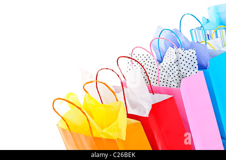 Many colorful shopping bags on white background Stock Photo