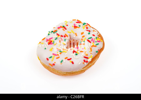 Vanilla frosted ring doughnut with colorful sprinkles on white background cut out Stock Photo