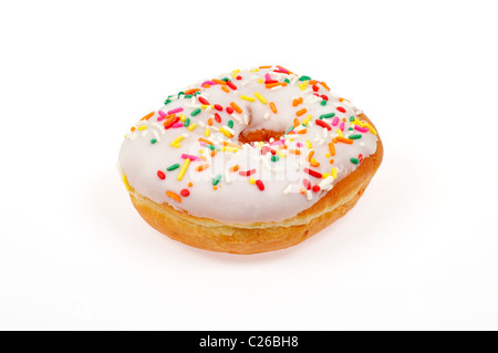 Vanilla frosted or iced ring donut with colorful sprinkles on white background cut out Stock Photo