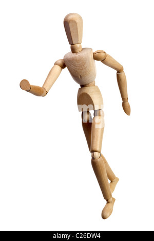 Running wooden mannequin isolated on white background Stock Photo