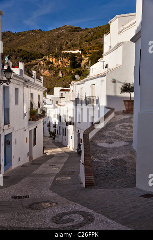 A street in the picturesque village of Frigiliana, near Nerja, Malaga Province, Andalusia, Andalucia southern Spain Stock Photo