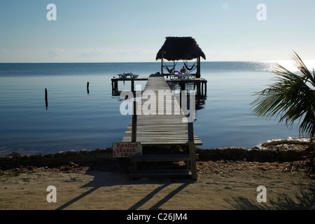 Jetty at the Barefoot Beach hotel on Caye Caulker island Belize Stock Photo