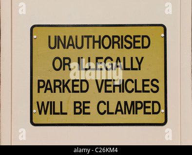 Wheel clamping sign, UK Stock Photo