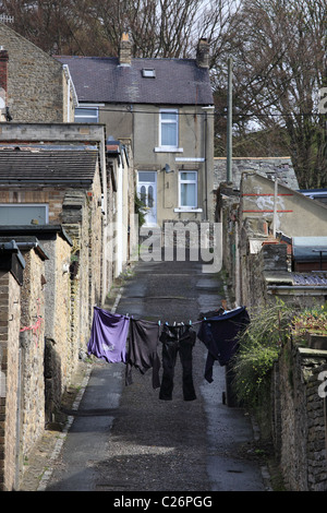 A washing line strung across a back street in Stanhope, Co. Durham, North East England, UK Stock Photo