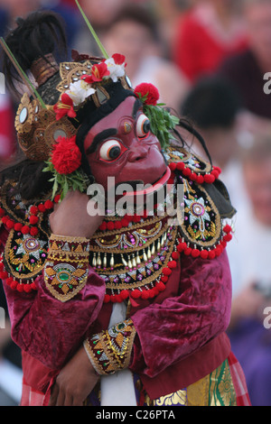 Masked character during a kekak dance. Stock Photo