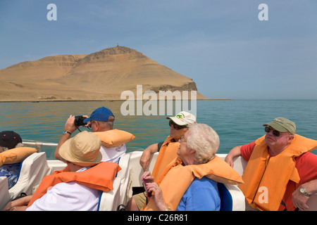 Tourists visiting the Palomino Islands, Callao, Lima, Peru Stock Photo