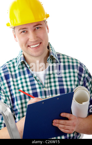 Portrait of a smiling worker making notes Stock Photo