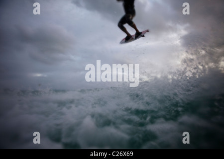 Kiteboarding Waimanalo @ Sunrise, female, Nina, airborne, airtime, jumping Stock Photo