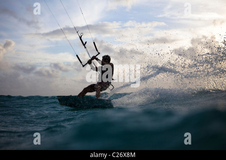 Kiteboarding Waimanalo @ Sunrise, male, David Giardini, carving some water Stock Photo
