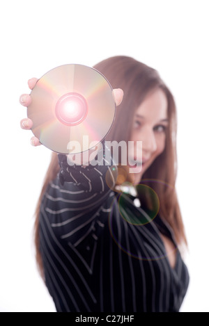 Brunette businesswoman holding disc out in front of her Stock Photo